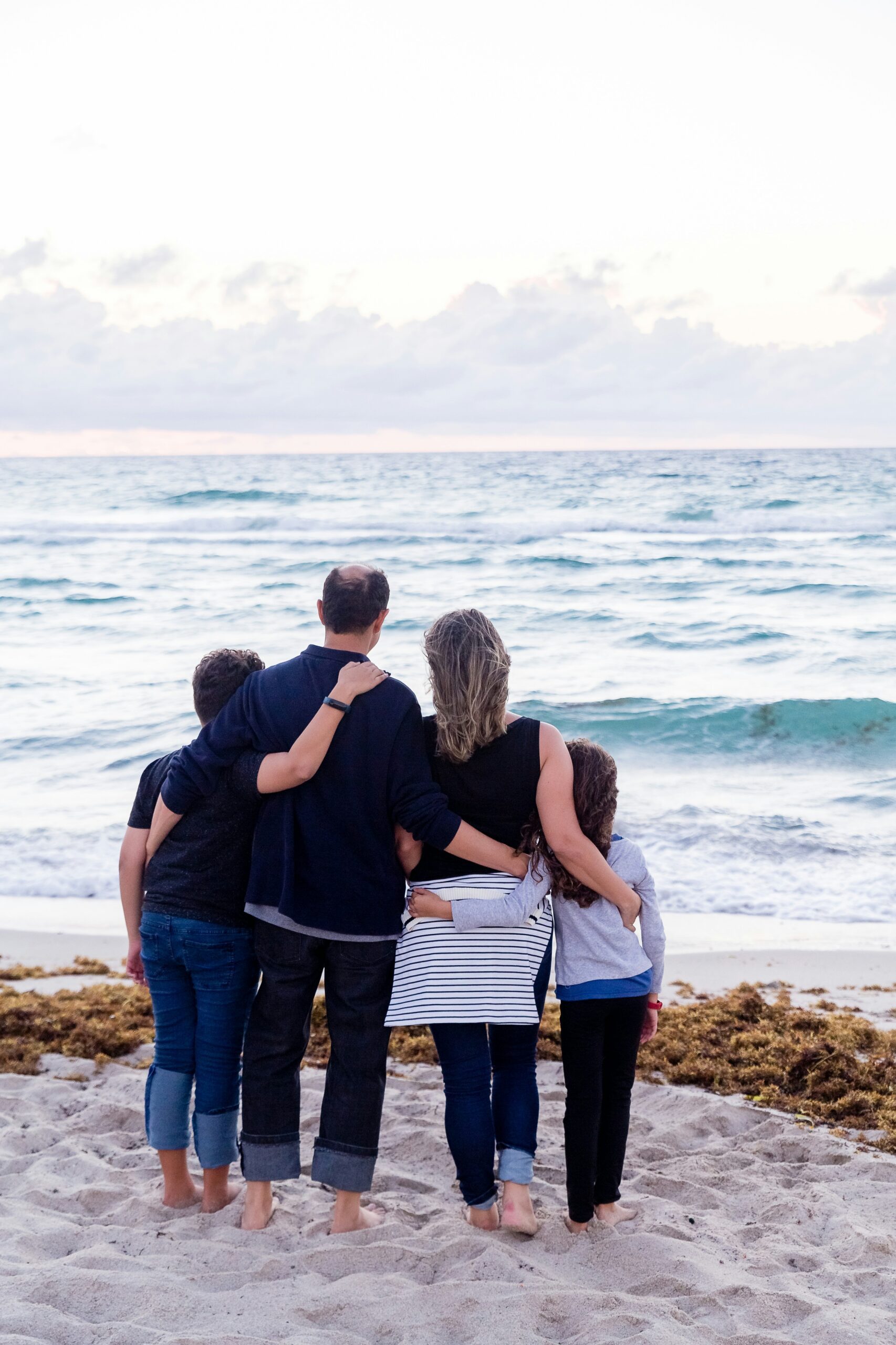 Family in the beach. What Happens After an Adoption Is Finalized in New Jersey.