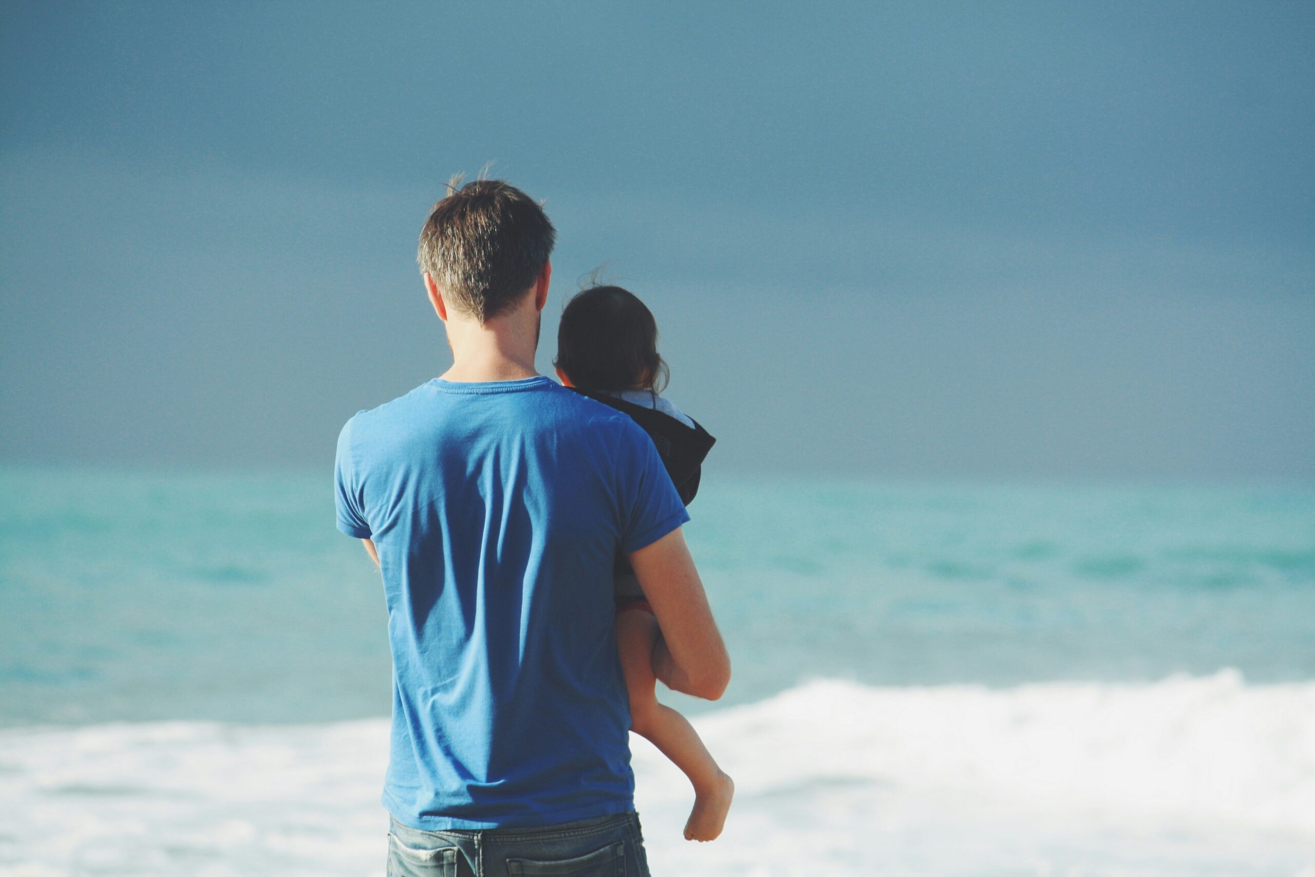 Father with his son in a beach. understanding the parenting time and visitation in Ocean County