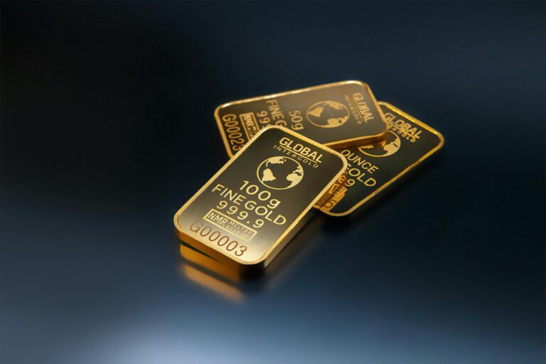 Three gold bars against a dark background representing the significant financial assets involved in a high-asset divorce in New Jersey